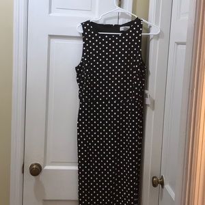 Adorable sleeveless polka dot dress!